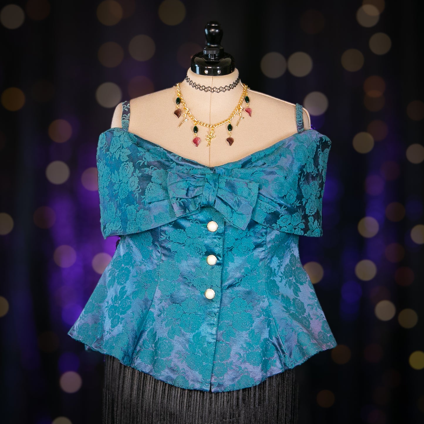 bewitching emeralds top