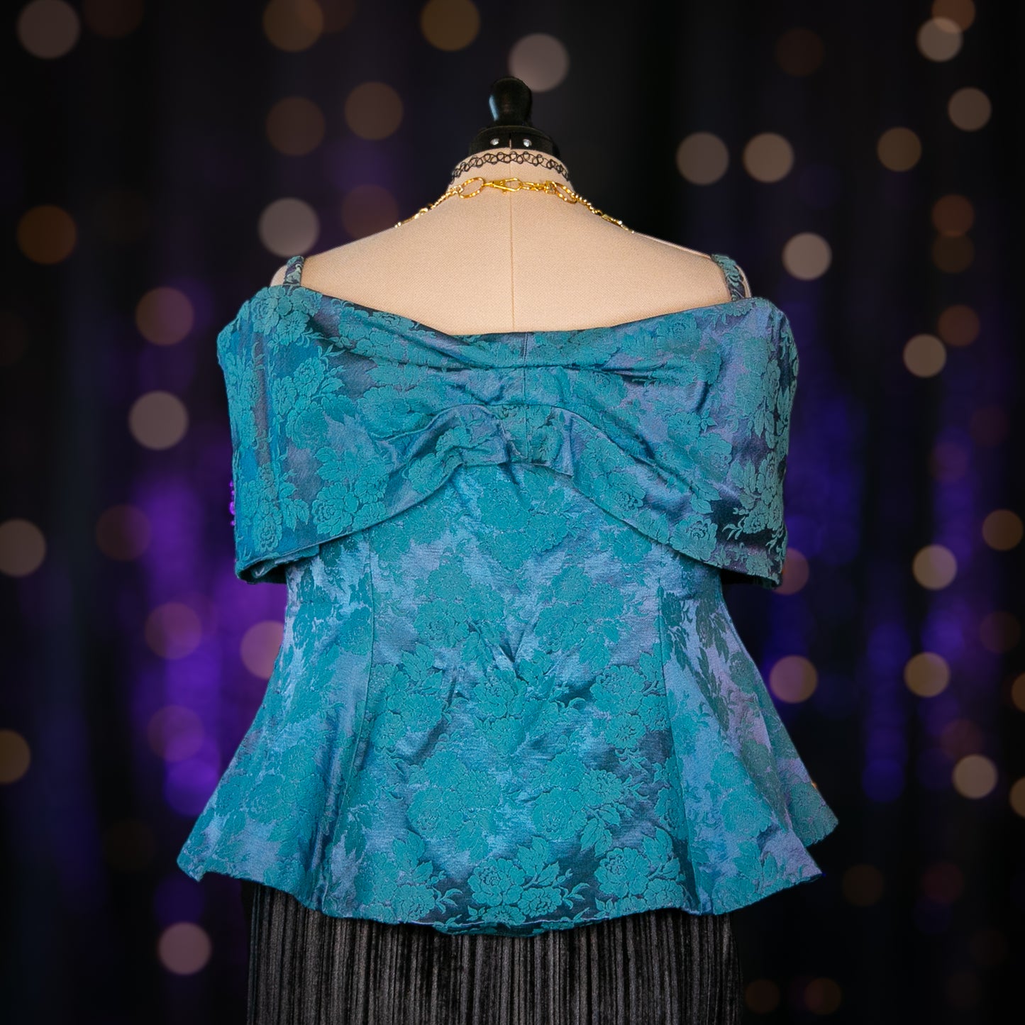 bewitching emeralds top