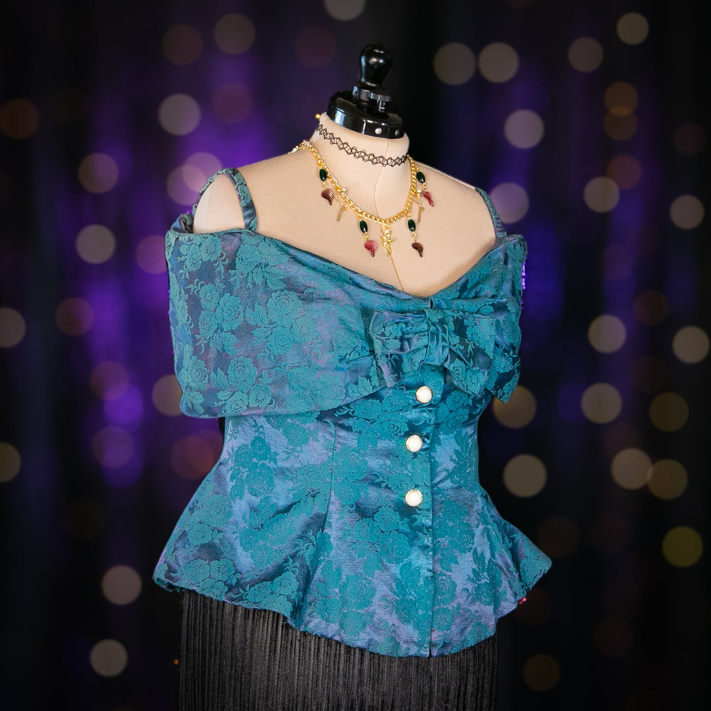 bewitching emeralds top