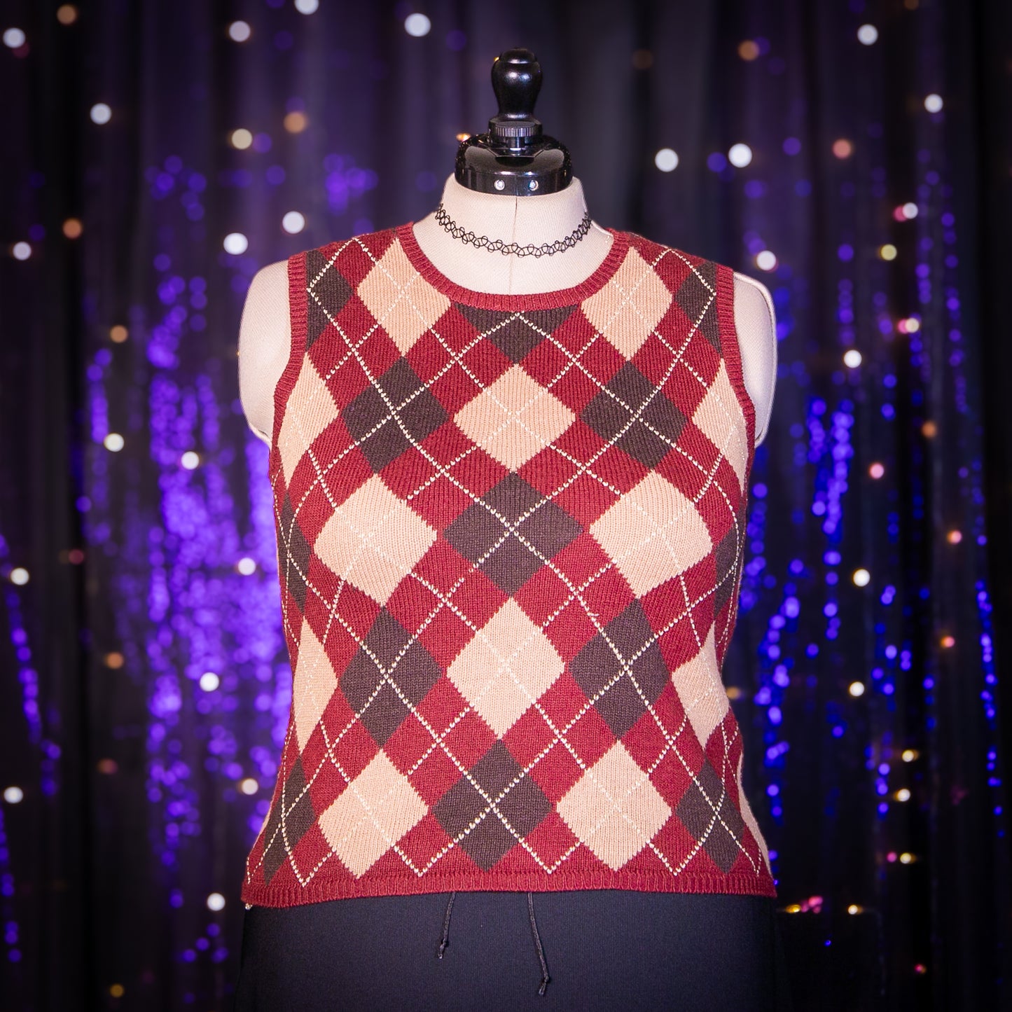 yule log sweater vest