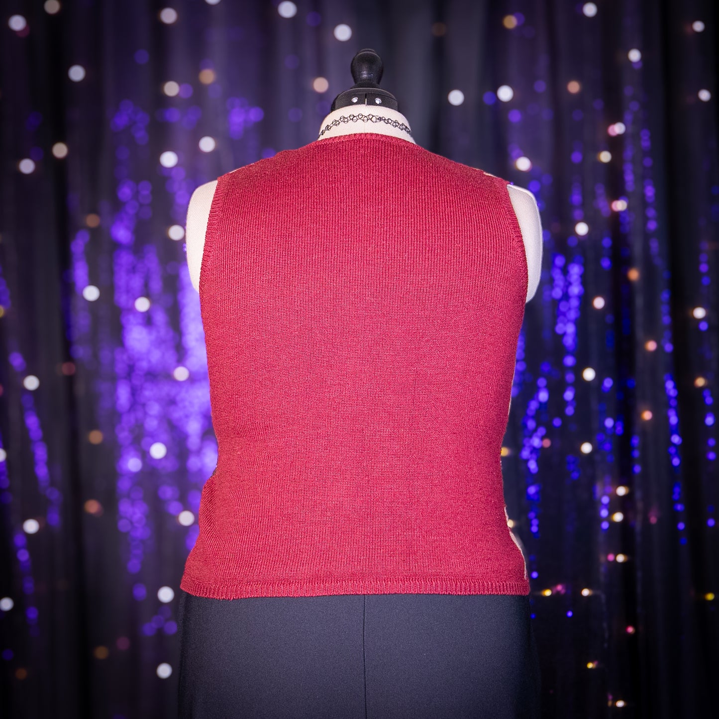 yule log sweater vest