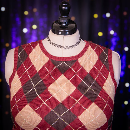 yule log sweater vest